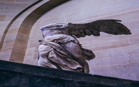 Who created the winged victory statue and when? Find out the artist and the story behind it.
